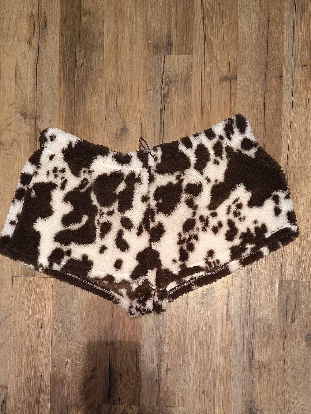 No Boundaries Brown & White Cow Print Fuzzy Shorts